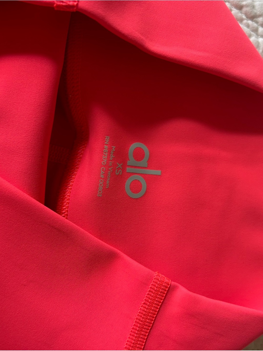 ALO Yoga Bright Coral/Neon Pink 7/8 Leggings - Picture 2 of 3